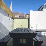 Vibrant Spring Street With Garden
