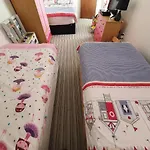 Pink House ,Opposite Beach ,Sleeps 6 , 2 Bedroom Ground Floor Self Contained Garden Flat , Private Entrance , Kitchen , Guaranteed Parking ,Wifi , Movies ,Bathroom ,Fridge , Microwave ,Bedroom 1, Double Bed & 2 Single Beds ,Bedroom 2 , Double Bed