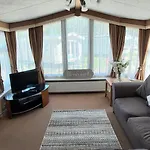 A Fashionable Caravan In A Peaceful Seaside Town