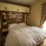 Lovely Caravan With Decking At Millfields Caravan Park Ref 87025F