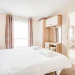 Rosefinch Sleeps 2 Persons-Private Hot Tub-Tranquil Holiday Away From It All Yet Not Far From St Austell- The Holiday Home Has One Bedroom, Living And Dining Area, Equipped Kitchen-Decking-Outdoor Furniture-Fishing Lakes-Non Pet Unit