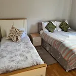 Massive 4 Bed Home Walking Distance To The City Lights, Perfect For Business Trips