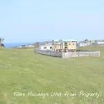 E04 Fresno, Riviere Towans