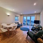 The Beach House & Porth Sands Apartments