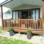 Relax In Stag Lodge At Caldecott Hall Park Norfolk 4 Berth Undercover Terrace