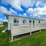 Beautiful Caravan With Decking At California Cliffs In Scratby Ref 50052L