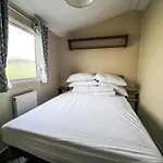 Lovely Caravan With Decking On California Cliffs Holiday Park Ref 50045C