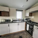 Lovely Caravan With Decking On California Cliffs Holiday Park Ref 50045C