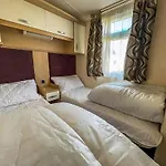 Lovely Caravan With Spacious Decking At North Denes In Suffolk, Ref 40134Nd