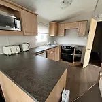Lovely Caravan With Decking To The Side At California Cliffs Ref 50072D