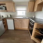 Lovely Caravan With Decking To The Side At California Cliffs Ref 50072D