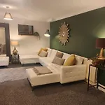 Beachfront 2-Bedroom Garden Flat With Hot Tub, Sleeps 8