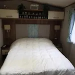 Lovely Caravan With Decking And Wifi At Suffolk Sands Holiday Park Ref 45017B