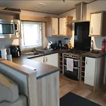 Lovely Caravan With Decking And Wifi At Suffolk Sands Holiday Park Ref 45017B