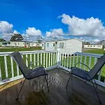8 Berth Caravan With Decking To Hire At Naze Marine In Essex Ref 17045Nm