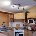 'The Hut' 4 Berth Caravan With Cot Bed