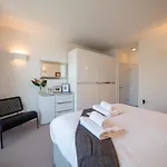 Riverside Apartment With Stunning Views & Patio