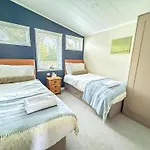 Stunning Lodge With Large Decking At Azure Seas In Suffolk Ref 32109Og