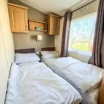 Lovely Caravan With Decking To The Side At California Cliffs Ref 50072D