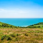 Badgers Den - Covehurst Bay Holiday Cottage