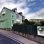 The Green House Surf Lodge